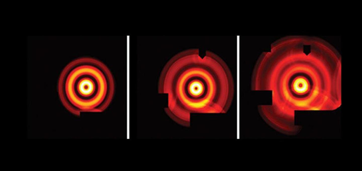 Three light projects showing sets of red and yellow concentric circles growing from left to right on a black background