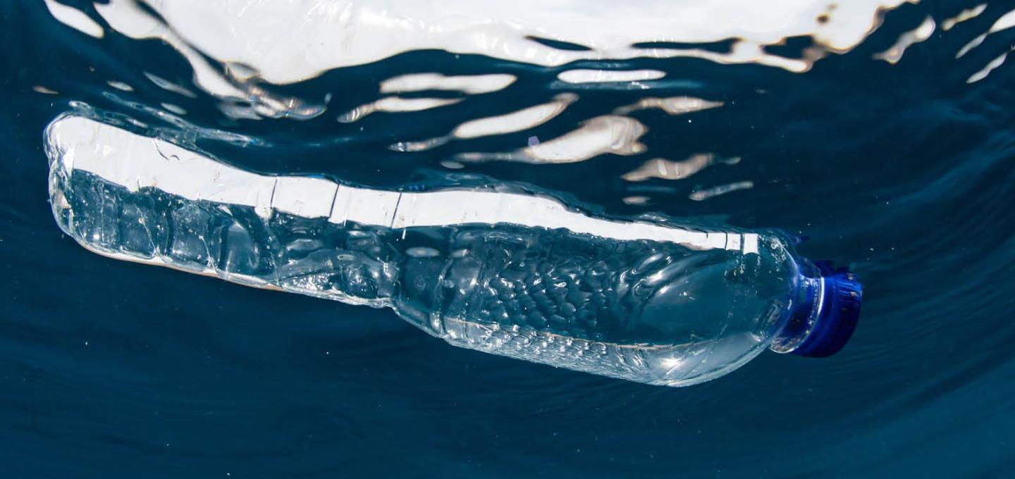 A plastic bottle floating in water