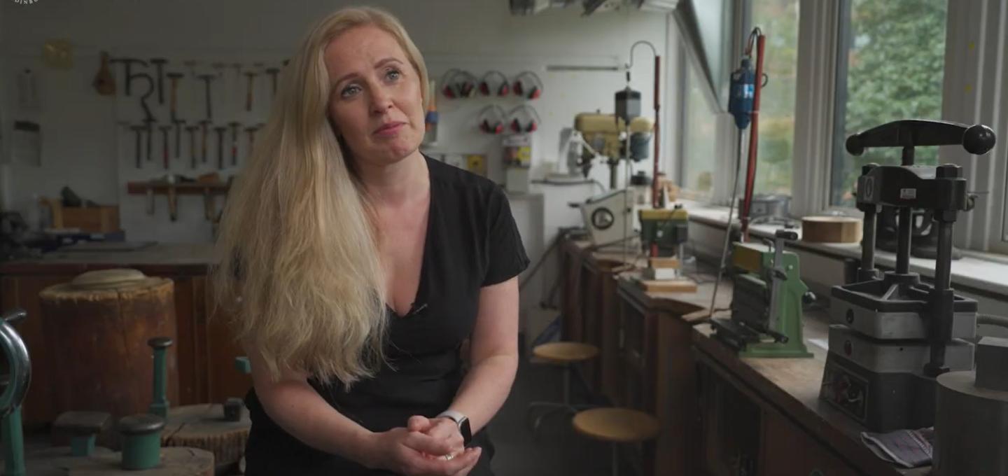 Head of the School of Design, Jessamy Kelly, sits in the jewellery studio.