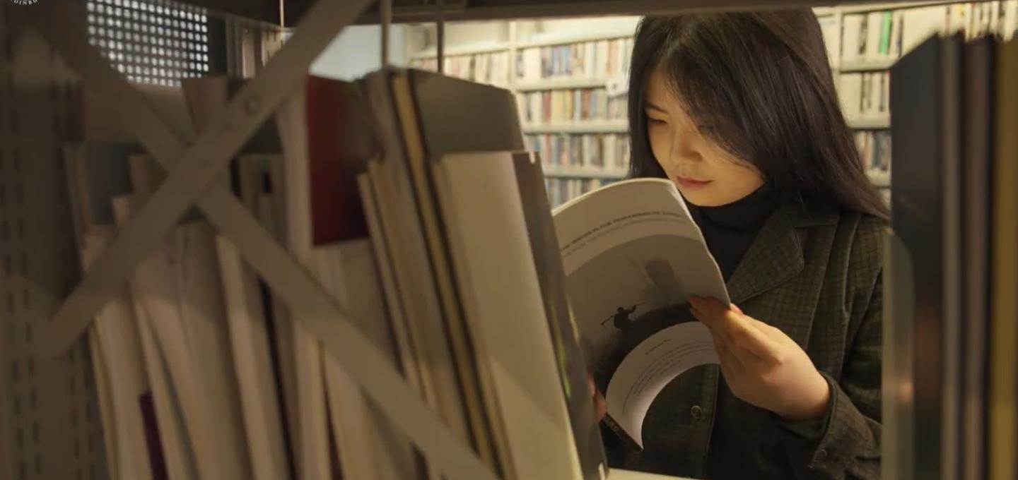A student on the Landscape and Wellbeing course in the ECA library.