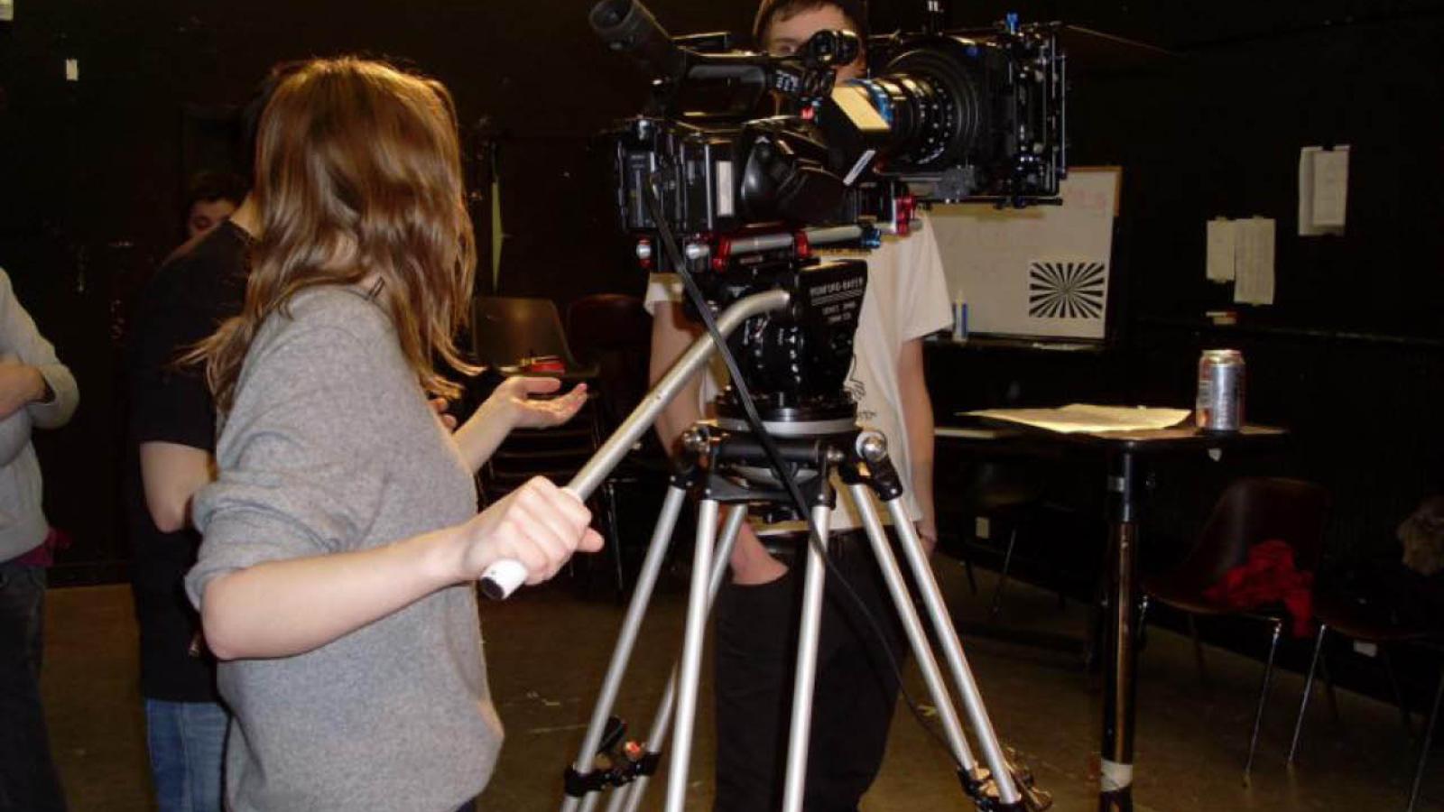 A student using a video camera