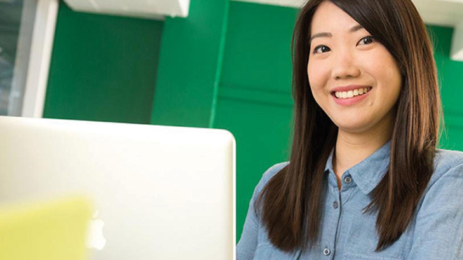 A student at a laptop