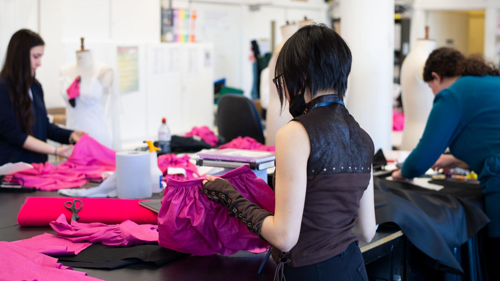 Students working on costumes in the Performance Costume studio.