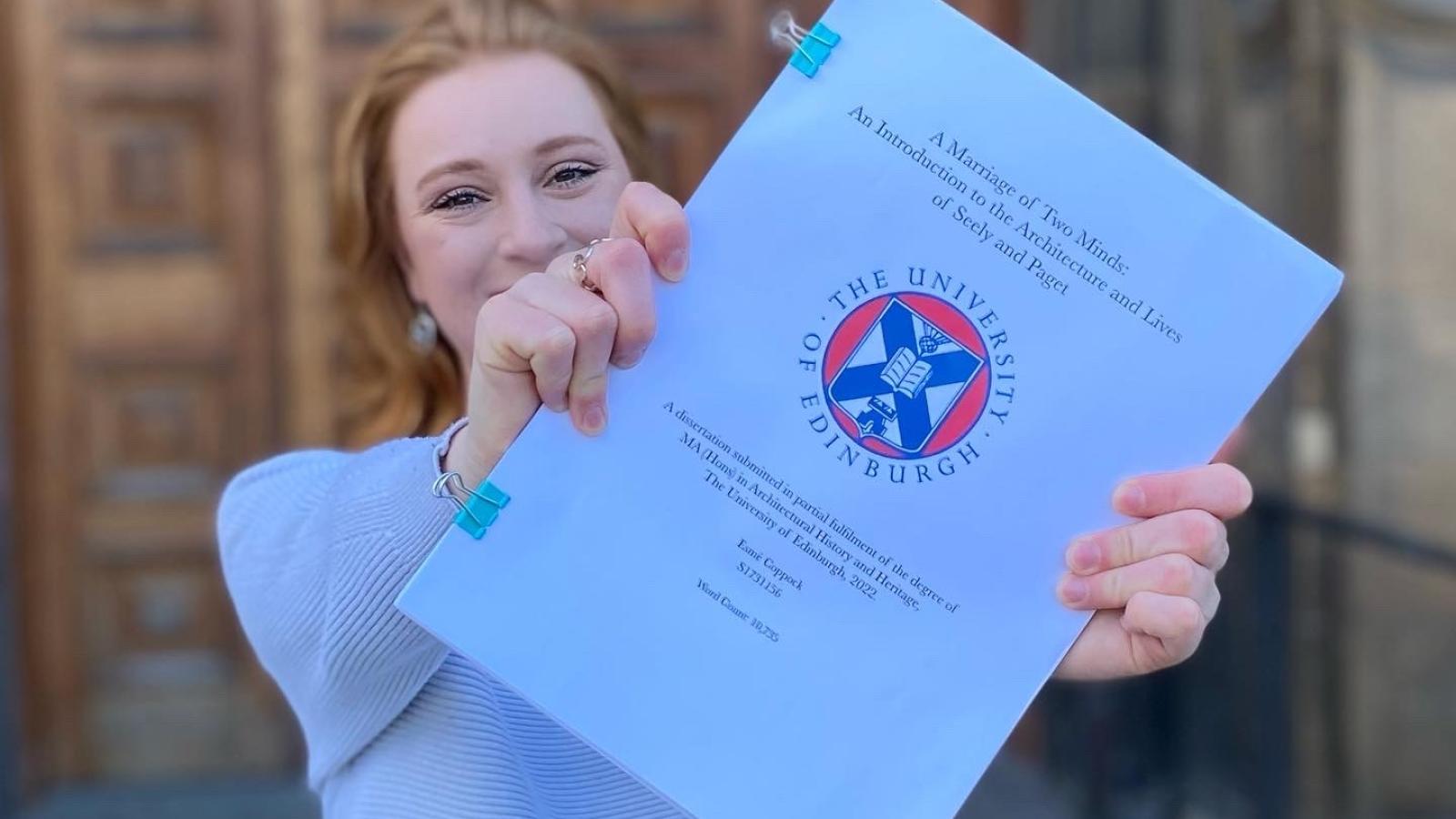 Esmé Coppock with her dissertation