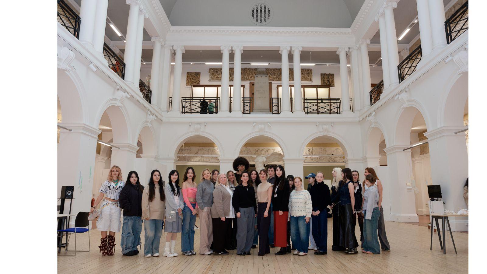 The group stand in the Sculpture Court at ECA.