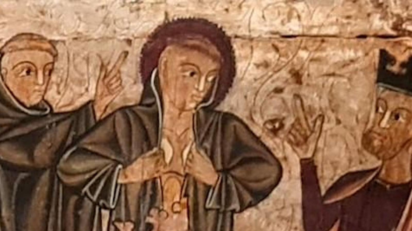 A painting of monks and a king depicting Eugenius revealing his secret. The central figure opens his cloak to reveal his bare chest while other monks look on and the king raises his hand to him.