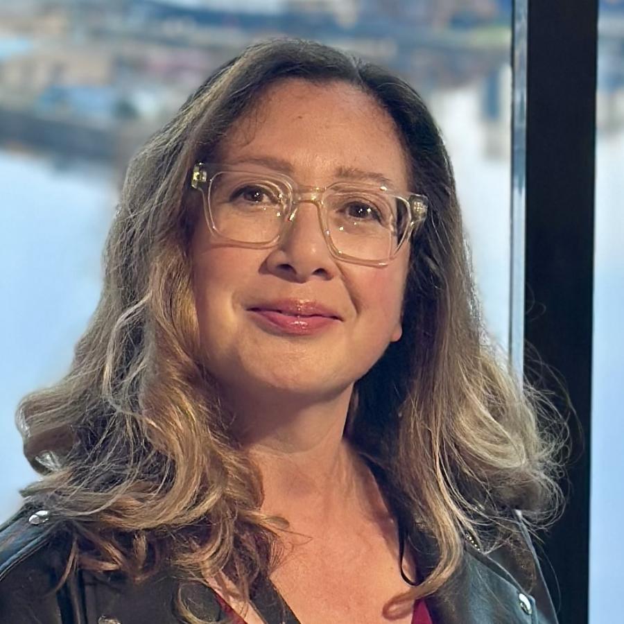 Academic Glaire Anderson smiling at the camera