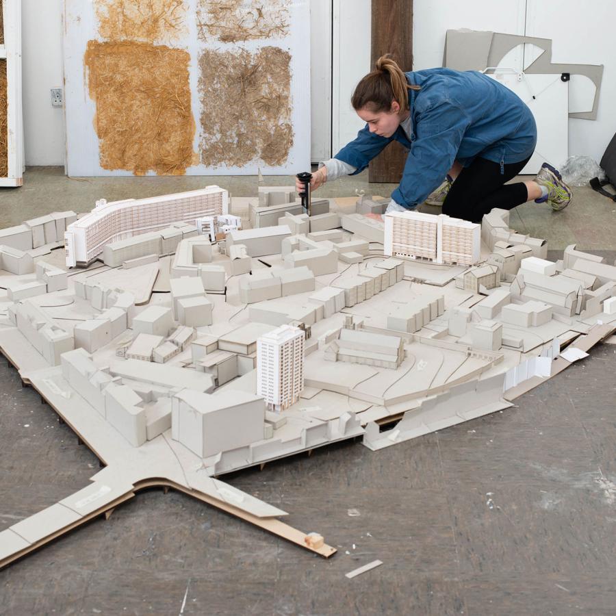 A student works on an architectural model in the ESALA studios.
