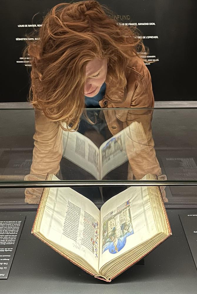 McNamee looking at manuscript