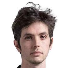 A person with short, dark brown hair