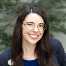 Danni Pascuma smiling at the camera