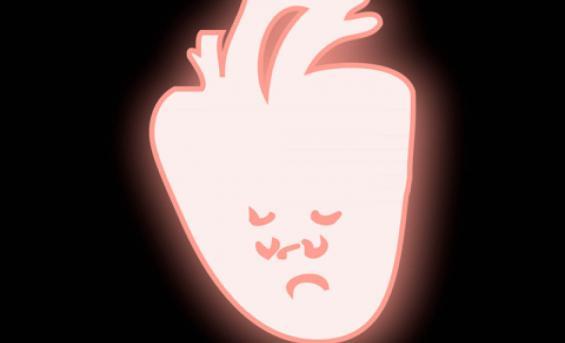 A glowing pink heart with a sad face