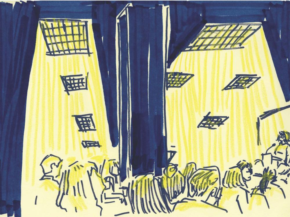 Blue and yellow illustration depicting a talk happening at a conference.