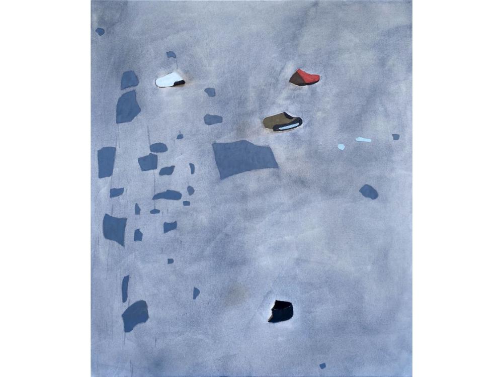 A blue/grey background with small abstract shapes on it; most of the abstract shapes are blue, but a few are other colours - brown, white, orange/red, black