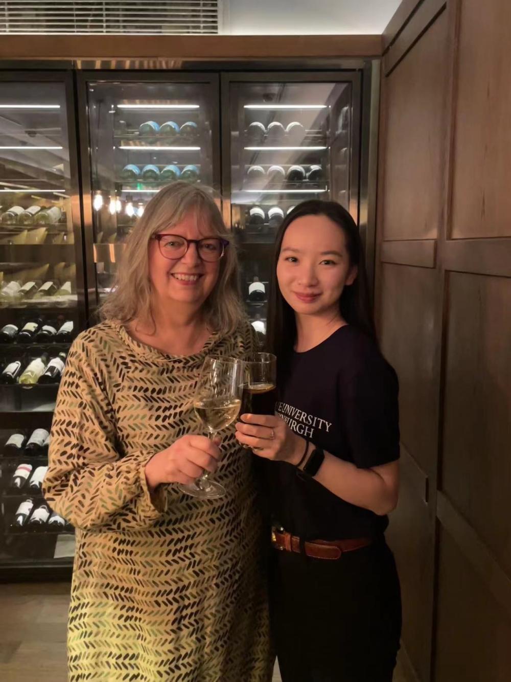 Juliette MacDonald with an alumni at the Shanghai alumni event.