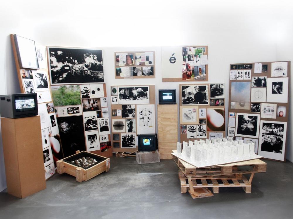 A display of a wide variety of work, including many striking black and white images