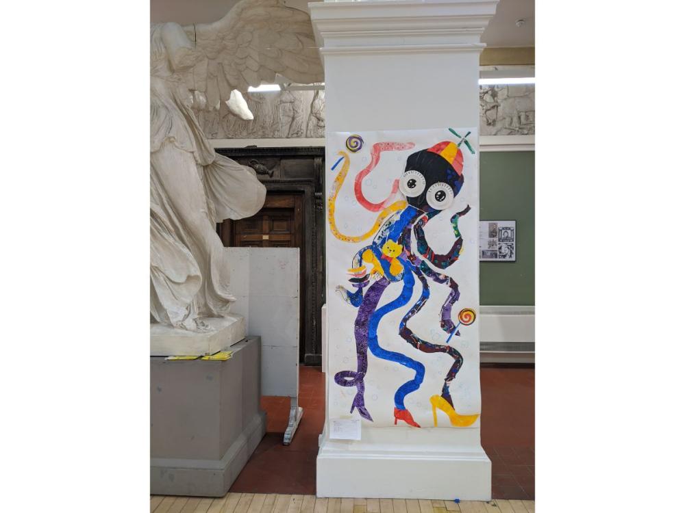 One of the Sculpture Hall columns decorated with a colourful image of an octopus, wearing high heels and a fun hat