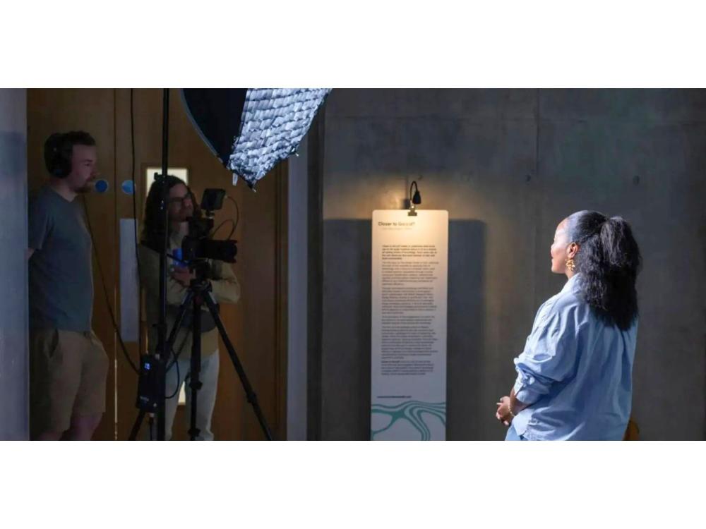 Artist being interviewed on camera