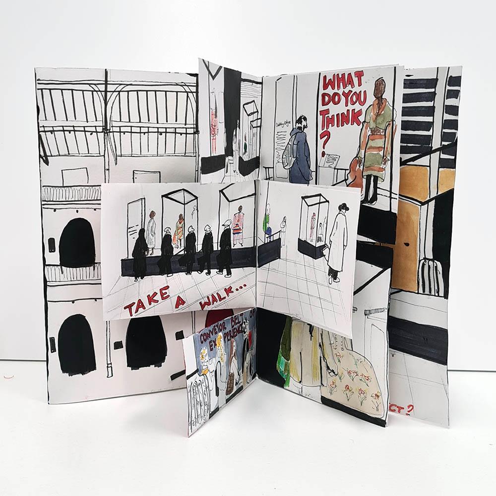 An illustrated zine is open like a book. It has 3D elements and shows interior views of the National Museum of Scotland.