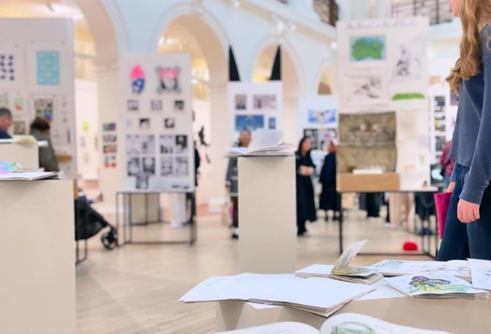 A photograph of an art exhibition in the Sculpture Court of Edinburgh College of Art.