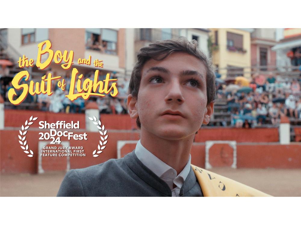 A shot from the film 'The Boy', of a boy standing in a bullring in Spain.